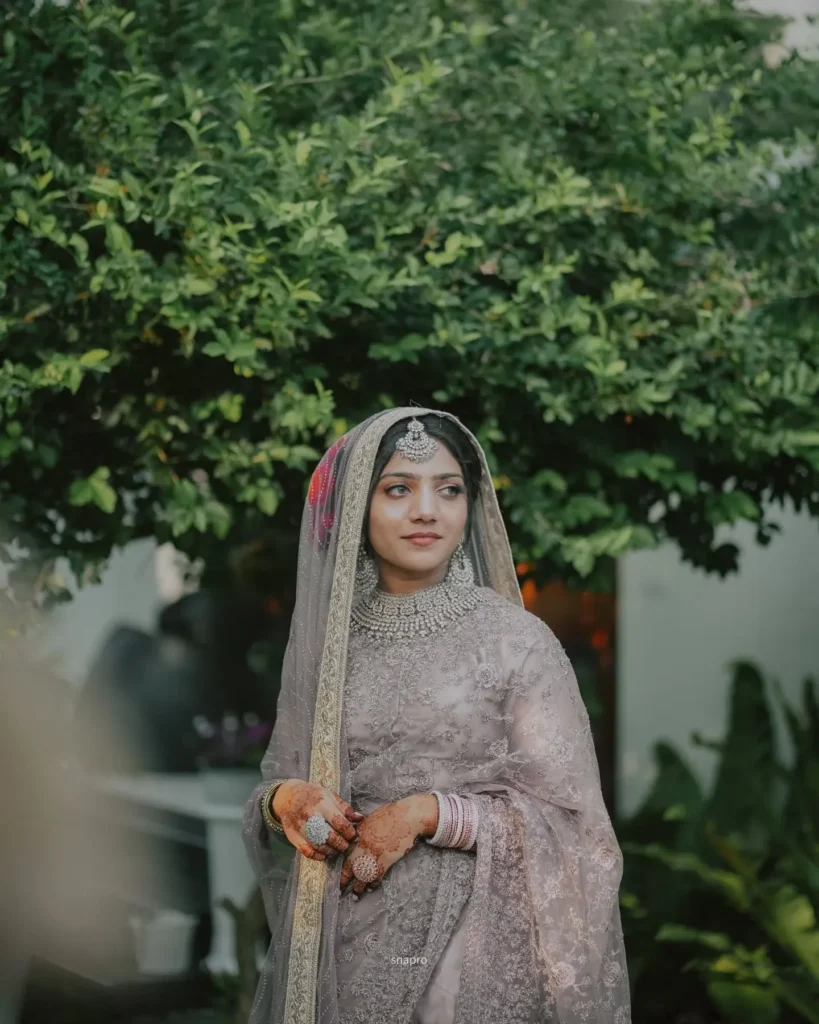 Pretty bride kerala wedding photography by snaproweddings